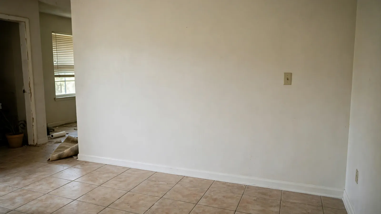After: The same wall with new drywall and fresh paint