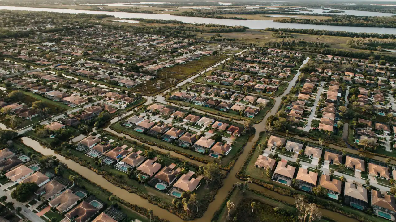Aerial view of a planned residential neighborhood with canals